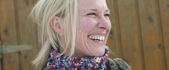 Germany, Bavaria, Woman looking away, smiling